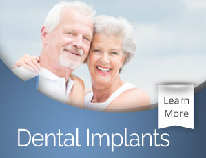 Happy senior couple smiling outdoors with "Dental Implants" text and "Learn More" button.